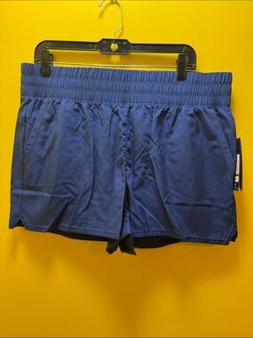 NWT Reebok running shorts.